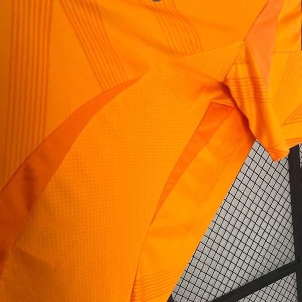 24-25 Real Madrid away orange - Image 8
